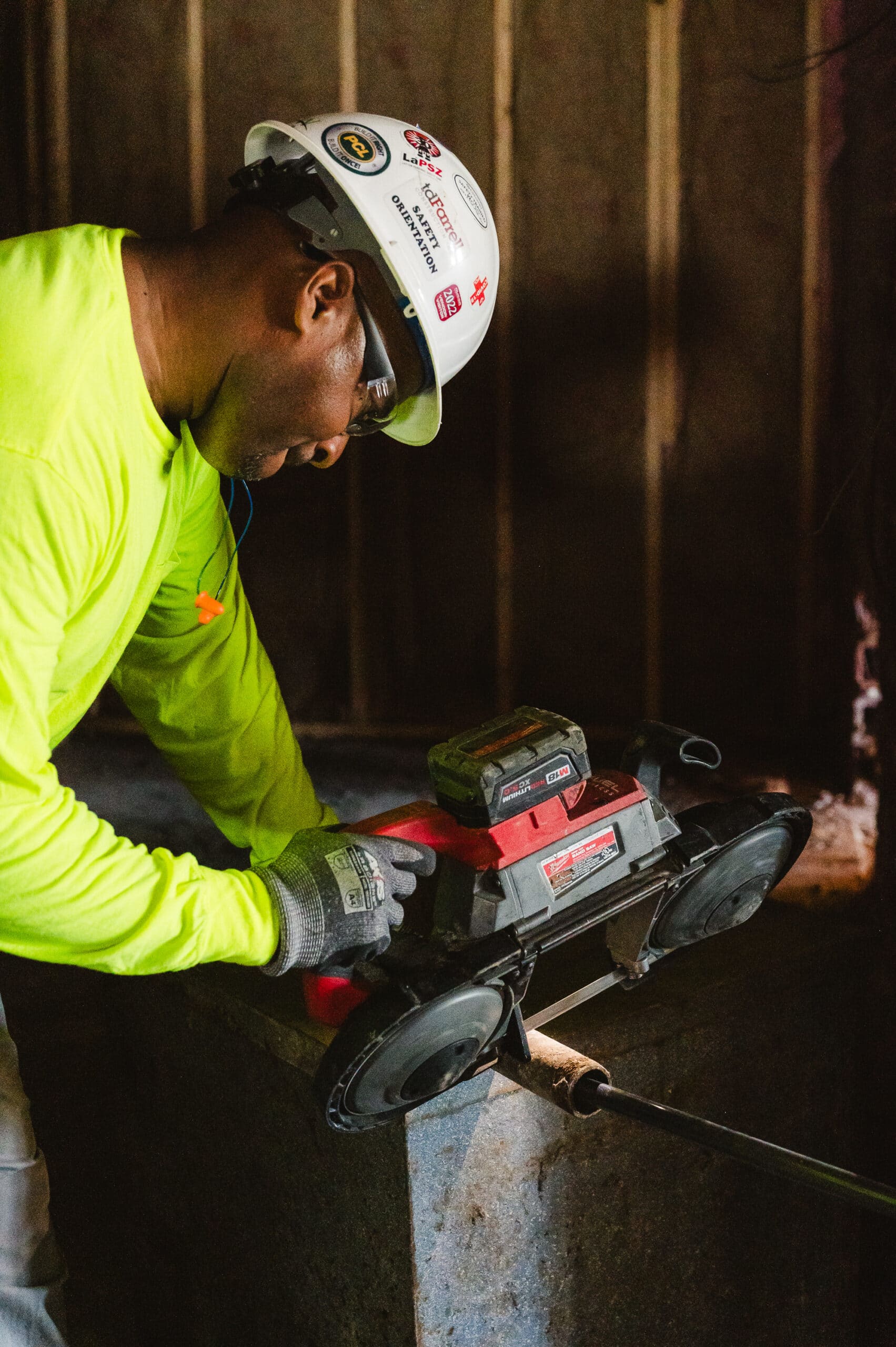 A manufacturer works on a job site