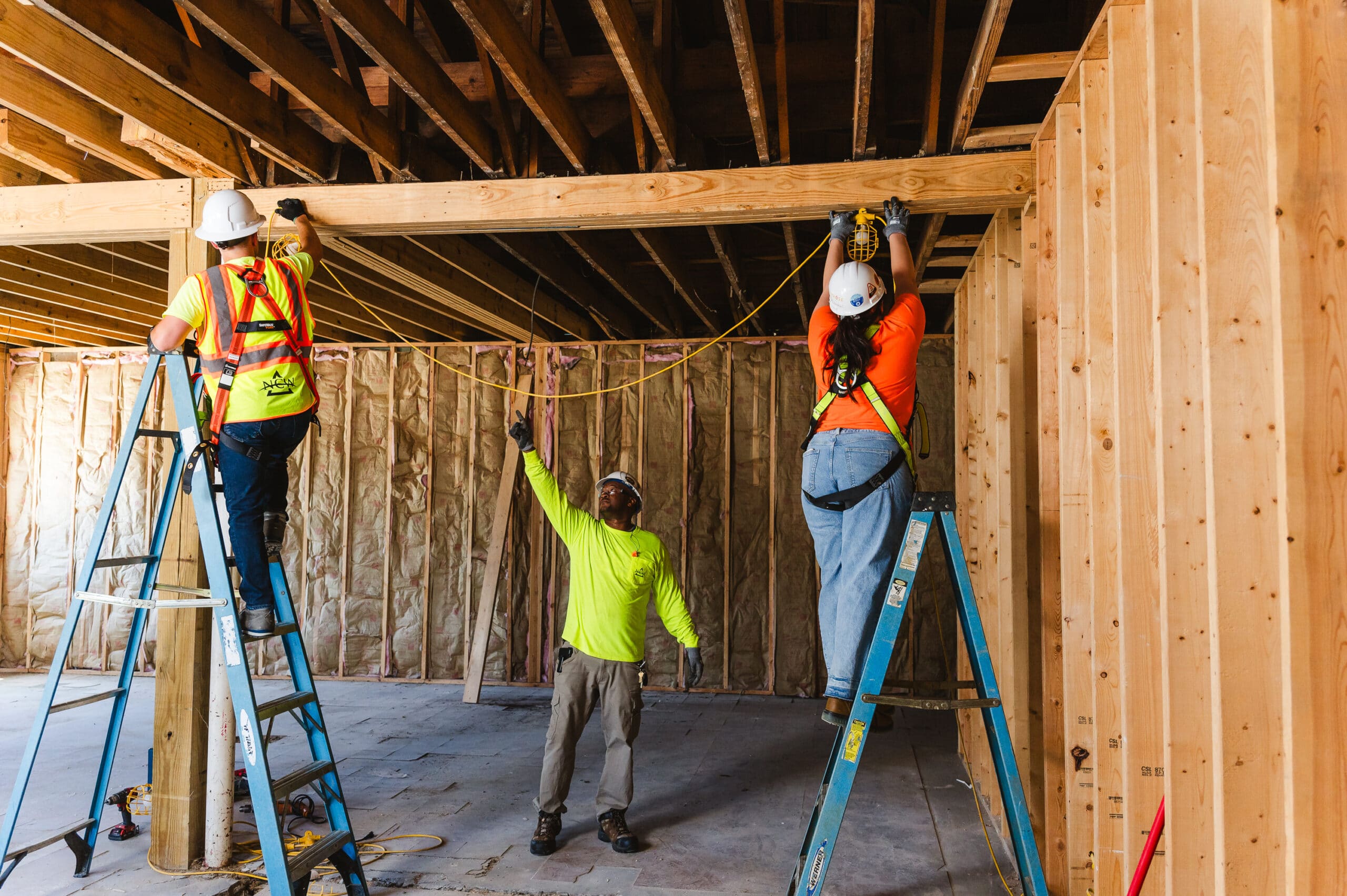 construction workers setting up a job site